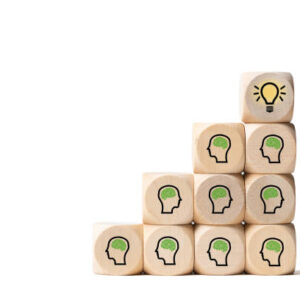 many people together having an idea symbolized by icons on cubes on white background